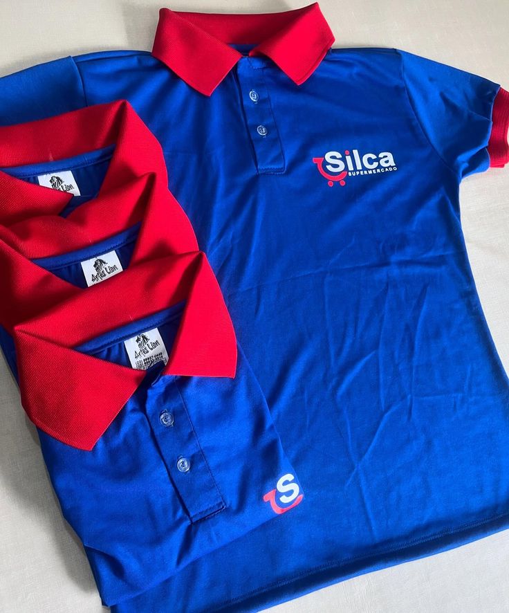 Polos azuis com bordado Silca Supermercado